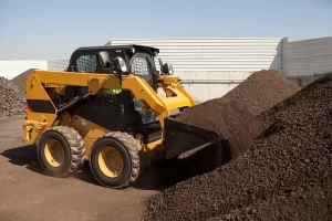 a bobcat is working on a construction site